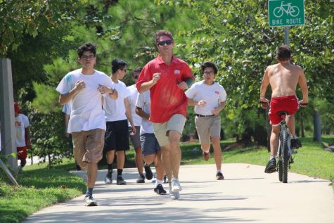 Seniors Daniel Griggs ’19 and Diego Guajardo ’19 jog down the sidewalk during Walk-a-thon. They were trying to get a little exercise in while also raising funds for the Student Council.

