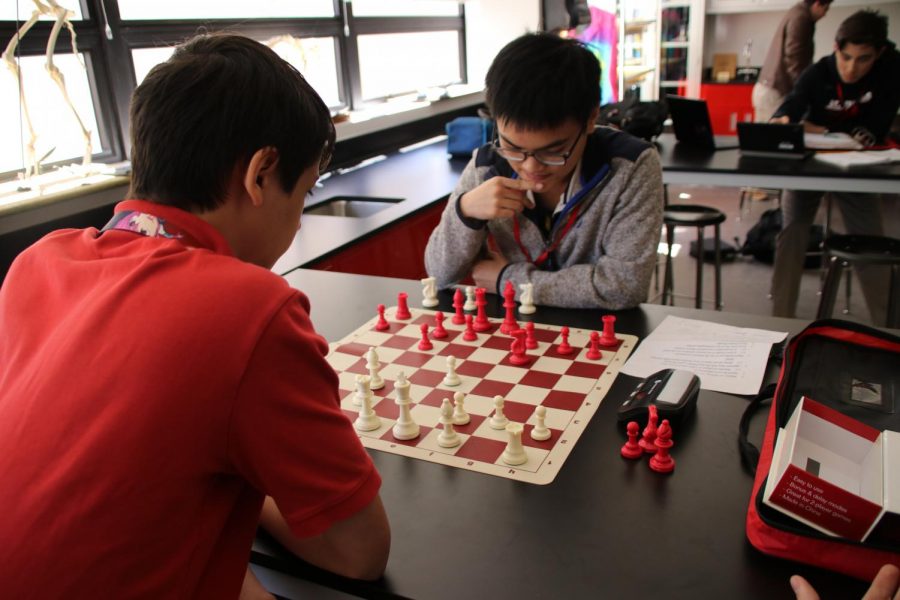 Dat Nguyen '21 and Zachary Voltz '21 play a practice match during the spring semester last year.  Both Nguyen and Voltz are making major contributions to this year's team.