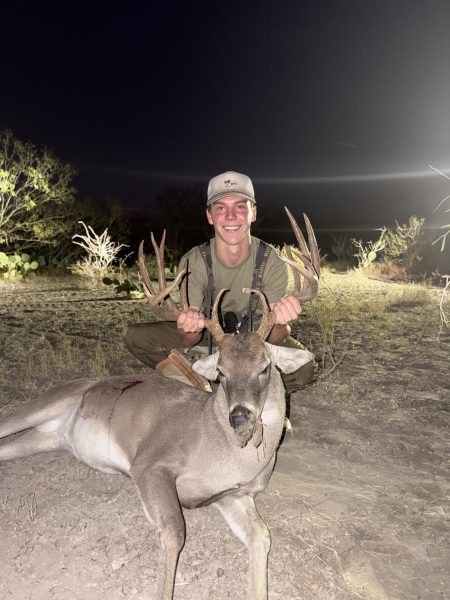 Luke Hubbard '26 with his prized, 14 point buck.
